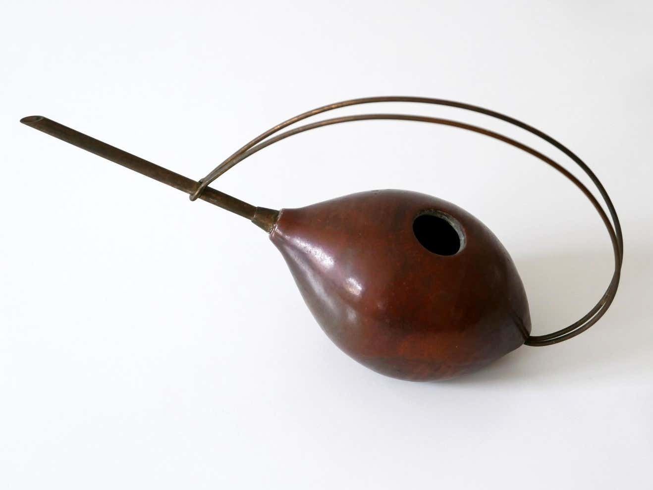 photo furniture Lovely Mid Century Modern Ceramic And Brass Watering Can, 1950s, Germany