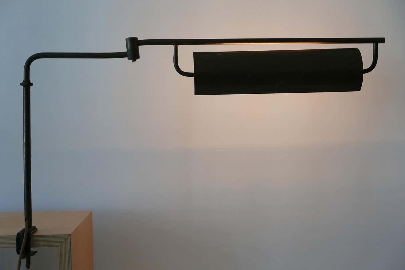 photo furniture Exceptional Modernist Bauhaus Articulated Brass Clamp Table Lamp, Germany, 1930s