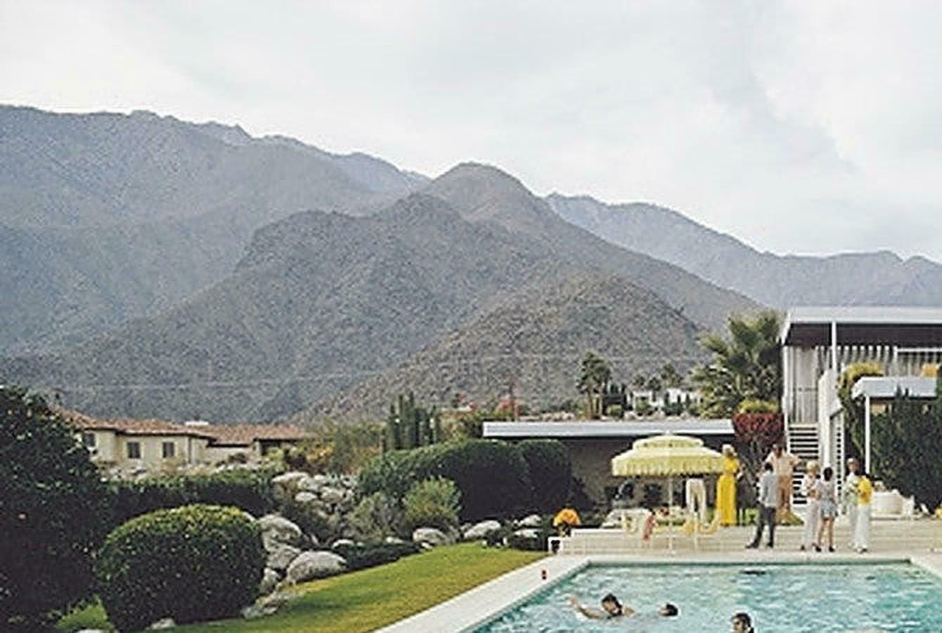 Poolside Interruption By Slim Aarons photo for sale