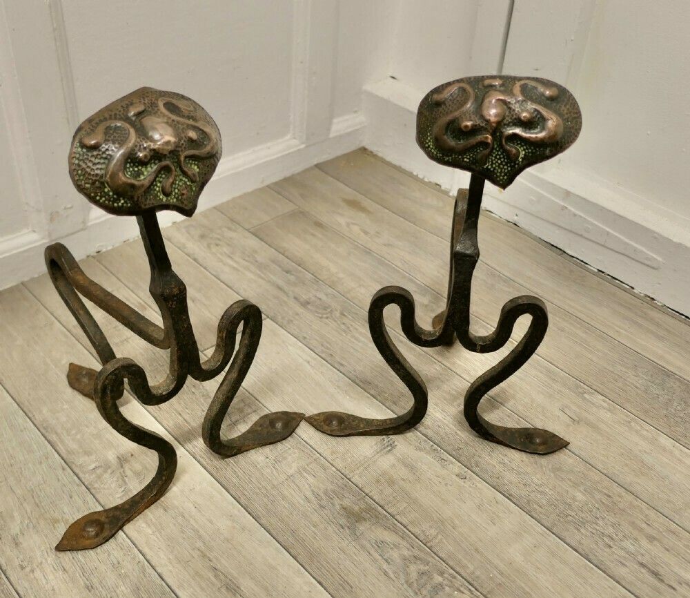 A Pair Of Arts And Crafts Copper And Iron Andirons Or Fire Dogs photo for sale