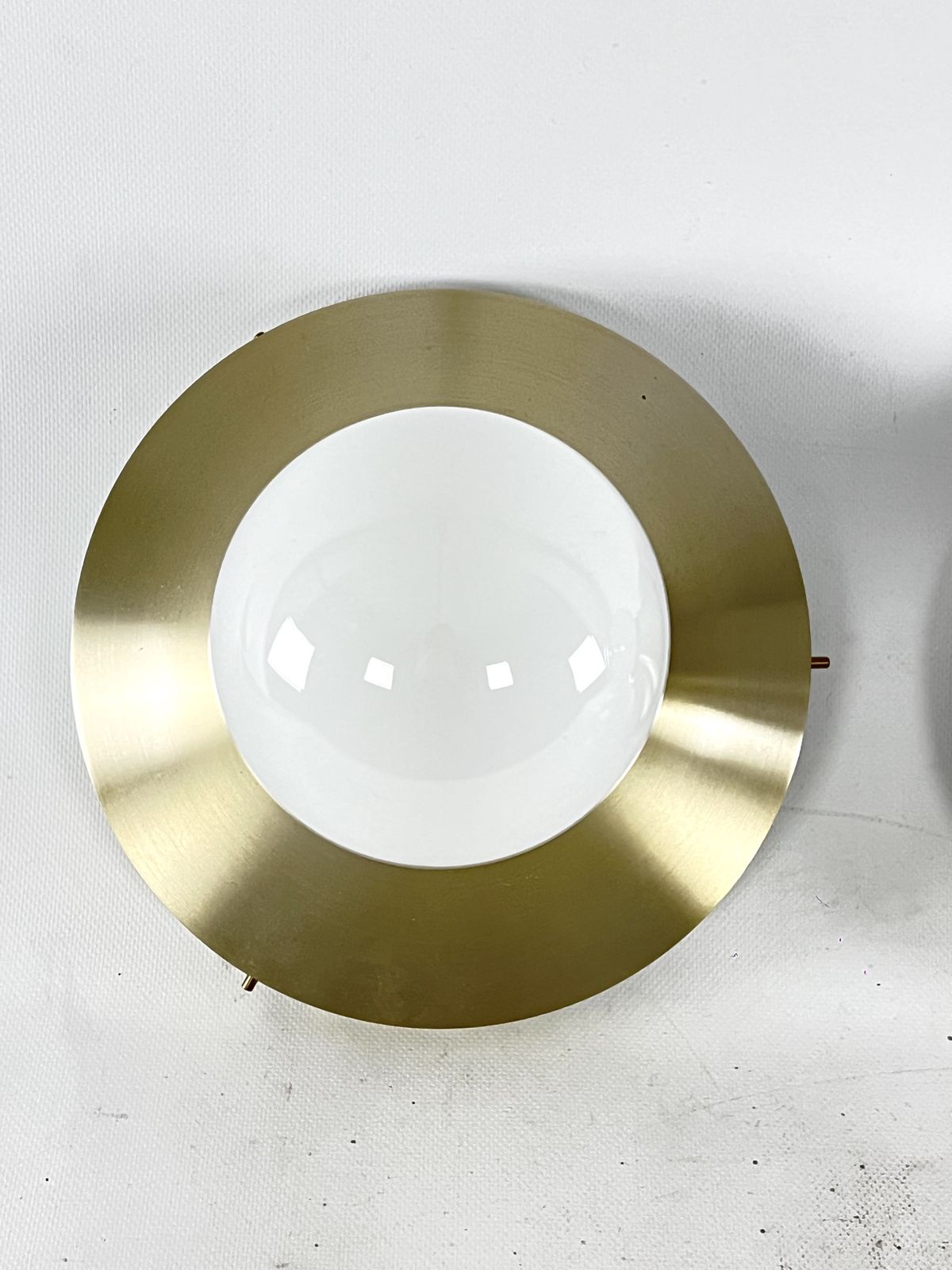Stilux Milano, Vintage Round Gilded Aluminum Wall Lamps From 60s. Set Of Two photo furniture