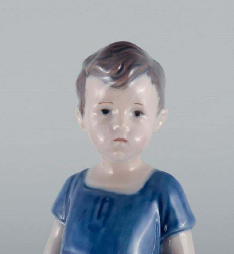 Royal Copenhagen, A Rare Figure Of A Boy. Model Number 519. photo vinterior
