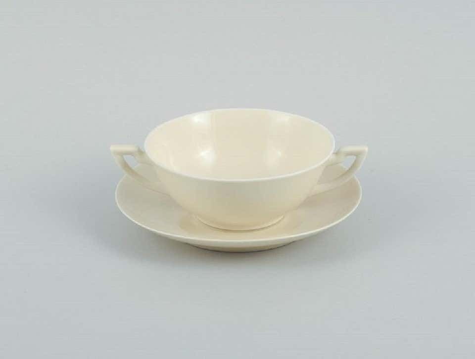 Nine Pairs Of Royal Copenhagen Cream Coloured Bouillon Cups With Saucers photo for sale