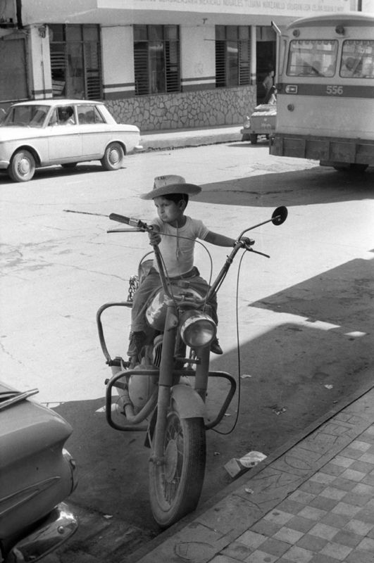 'Biker Boy' Homer Sykes Framed In White photo furniture