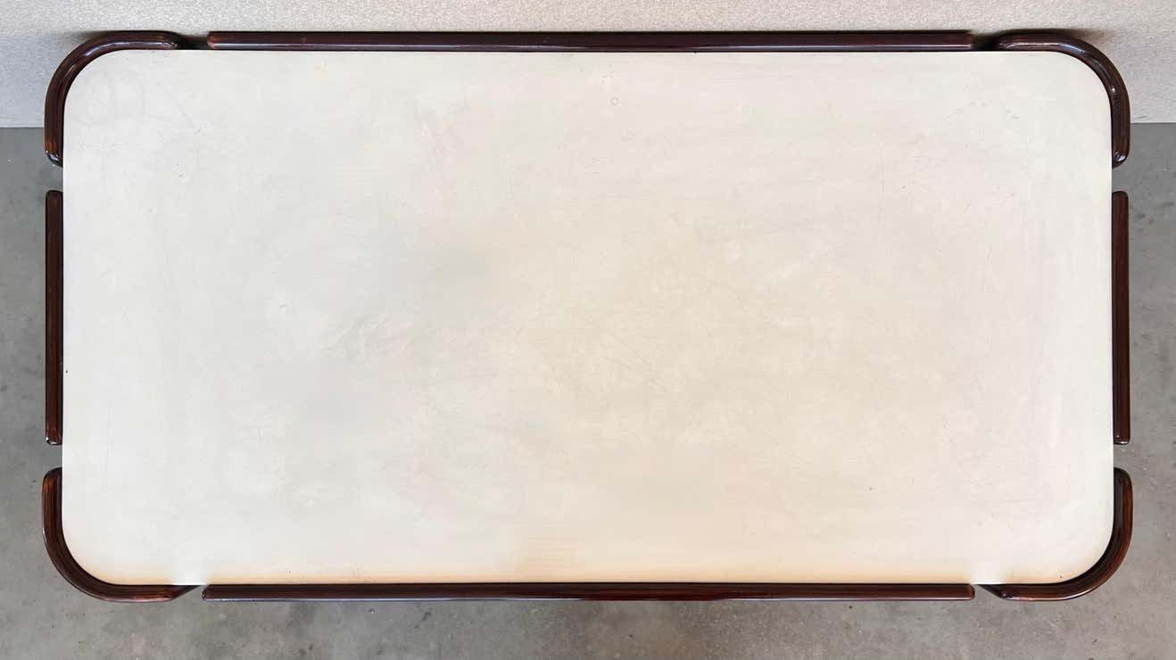 Table rectangulaire mid-century modern, pieds courbés et plateau blanc photo buy