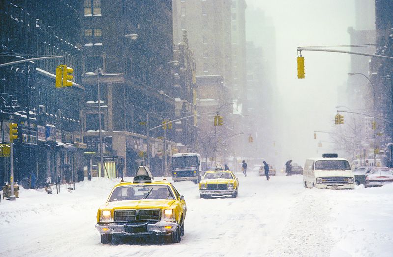 'Yellow Cabs In The Snow' Homer Sykes Framed In White photo furniture