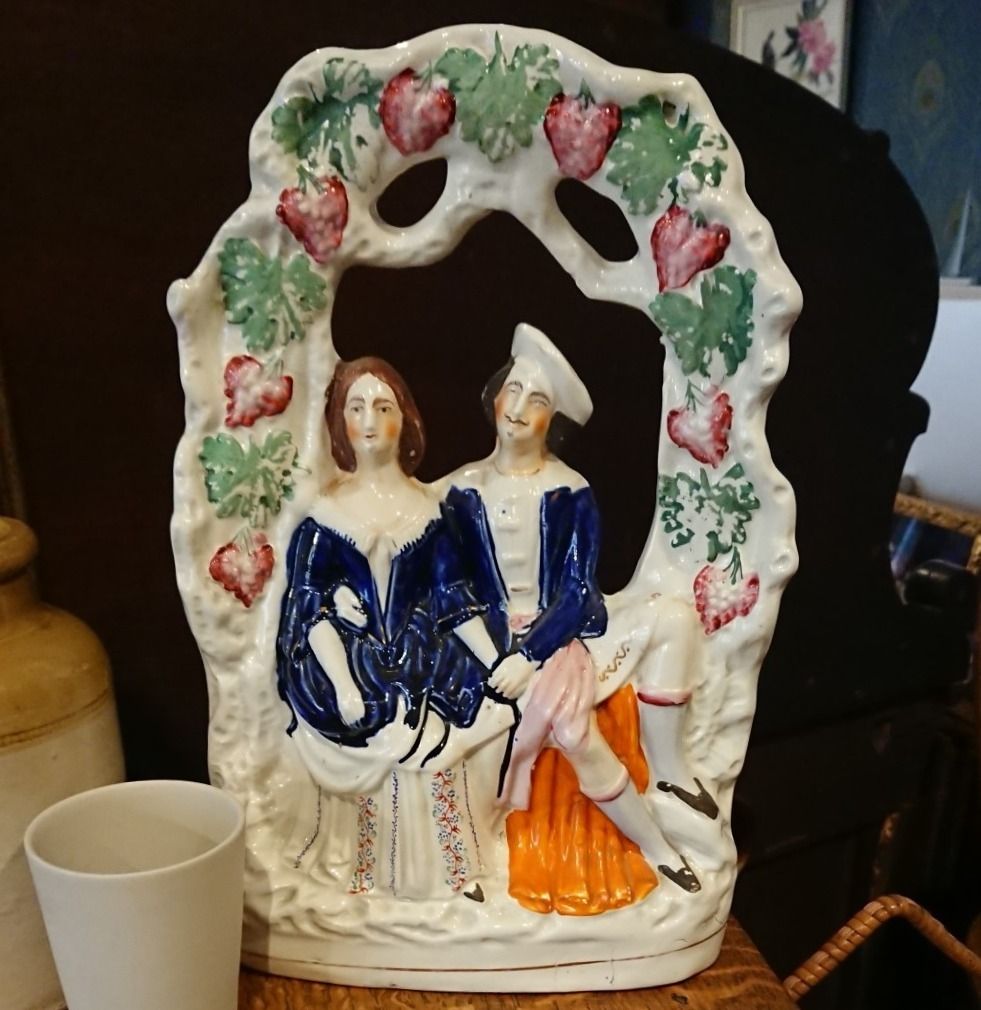 Staffordshire Flat Back Figurine Of A Couple Under A Bower Of Vines