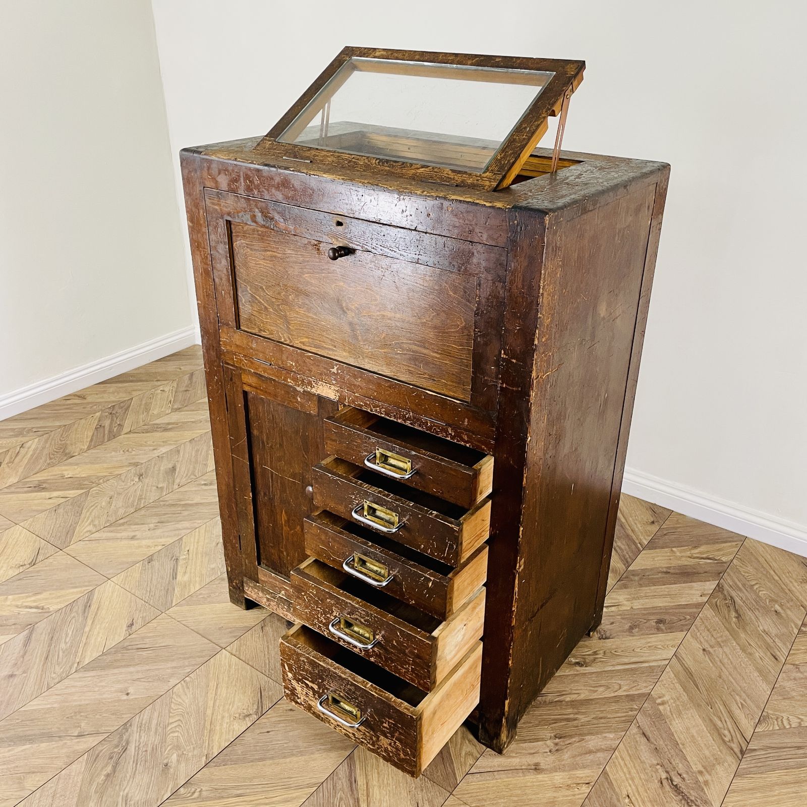 photo furniture Large Industrial Workshop Cabinet With Brass Handles + Glass Top, 1920s