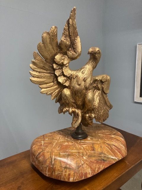 Ancient Eagle Sculpture In Gilded Wood From The 1600s On A Marbled Base photo vintage
