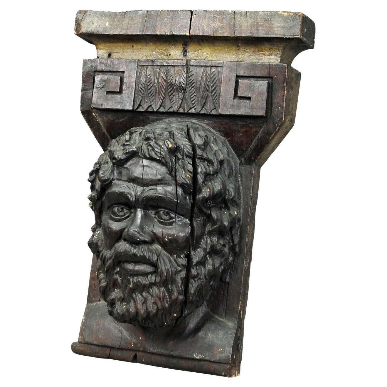 Wooden Sculpture Of A Masculine Face
