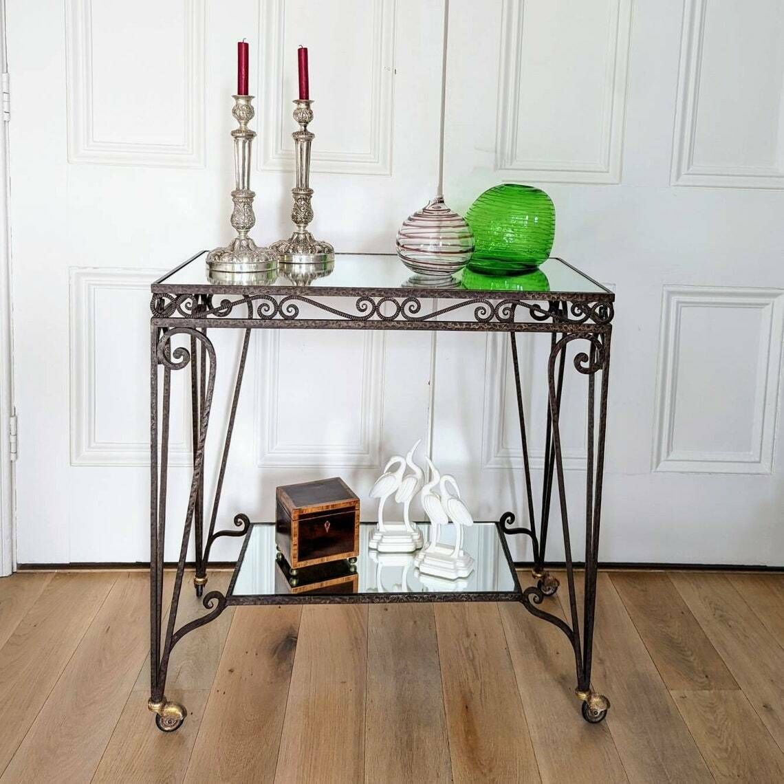 A Mid Century French Mirrored Glass And Wrought Iron Two Tier Cocktail Or Desert Trolley